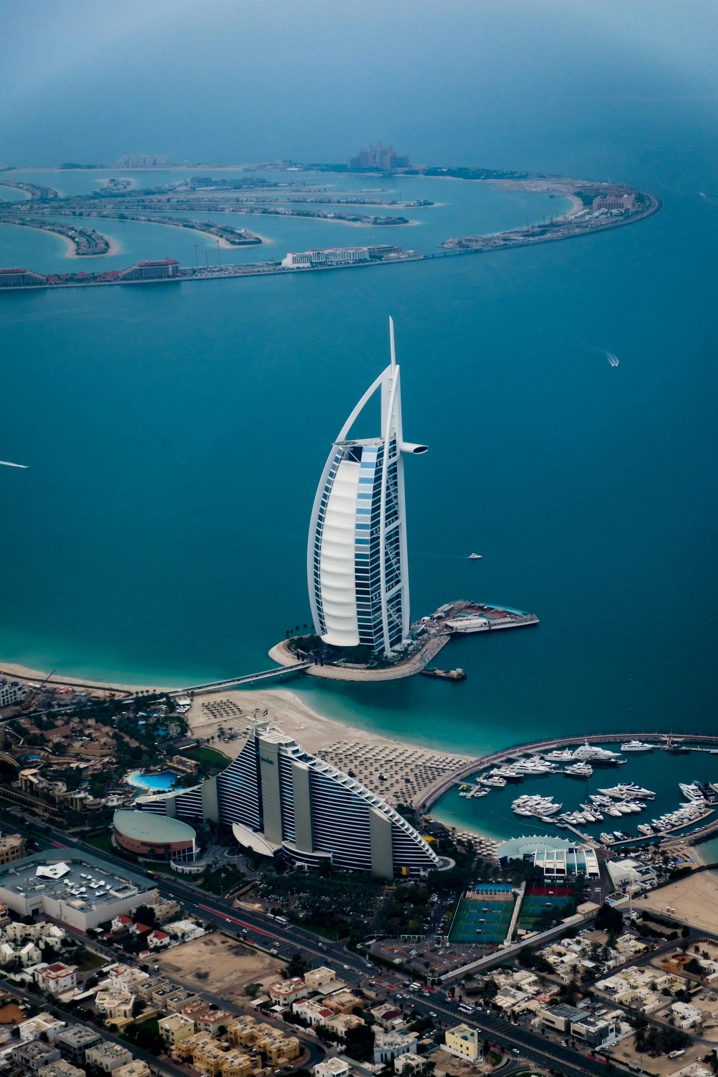 Aerial view of the Burj Al Arab with Palm Jumeirah beyond